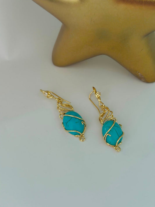 Sarmal Detaylı Firuze Çelik Küpe