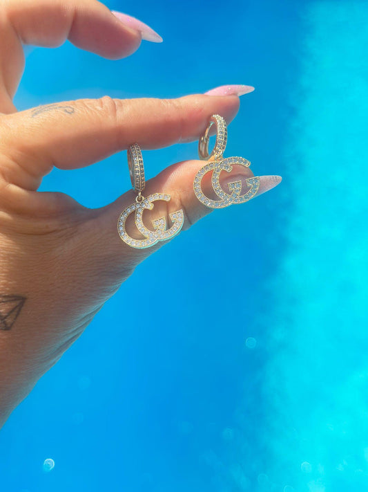 Zirkon Taş Detaylı Sallantılı GG Çelik Küpe